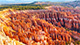 Bryce Canyon National Park is known for crimson-colored hoodoos, which are spire-shaped rock formations.